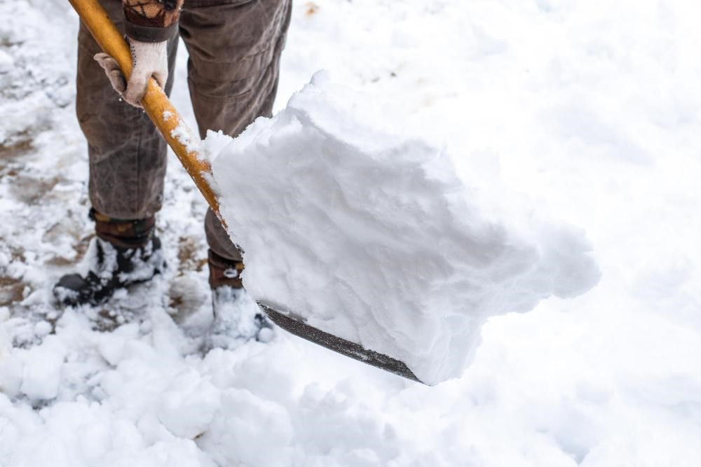 Image illustrating professional Snow Removal worker in New York