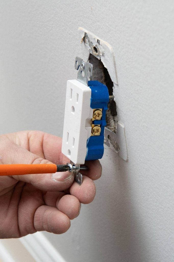 Image illustrating electrical outlets that need to be inspected by a professional electrician in New York